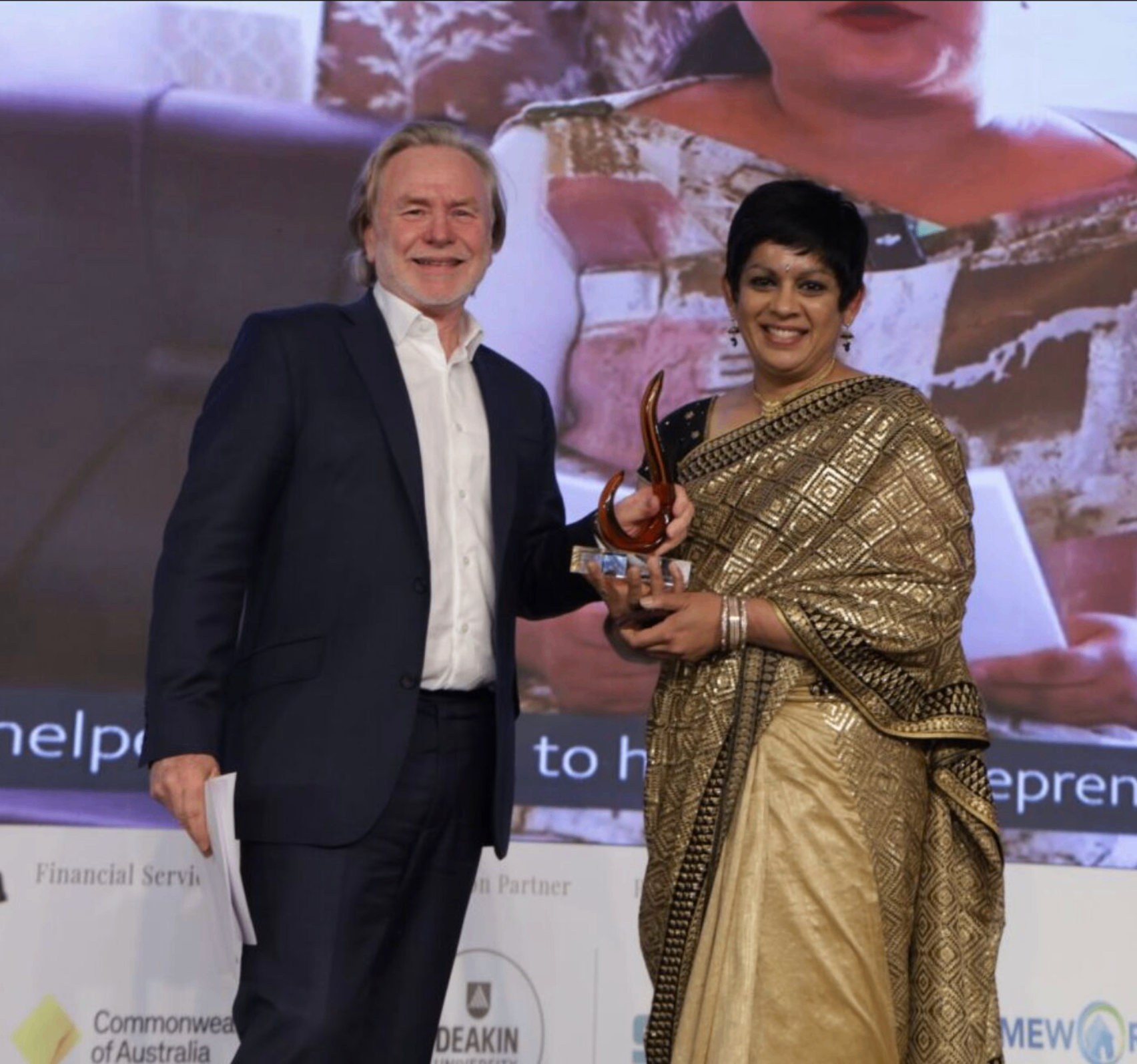 Aruna Venkatachalam presented with the IABCA 2025 Award by Philip Green OAM, Australian High Commissioner to India